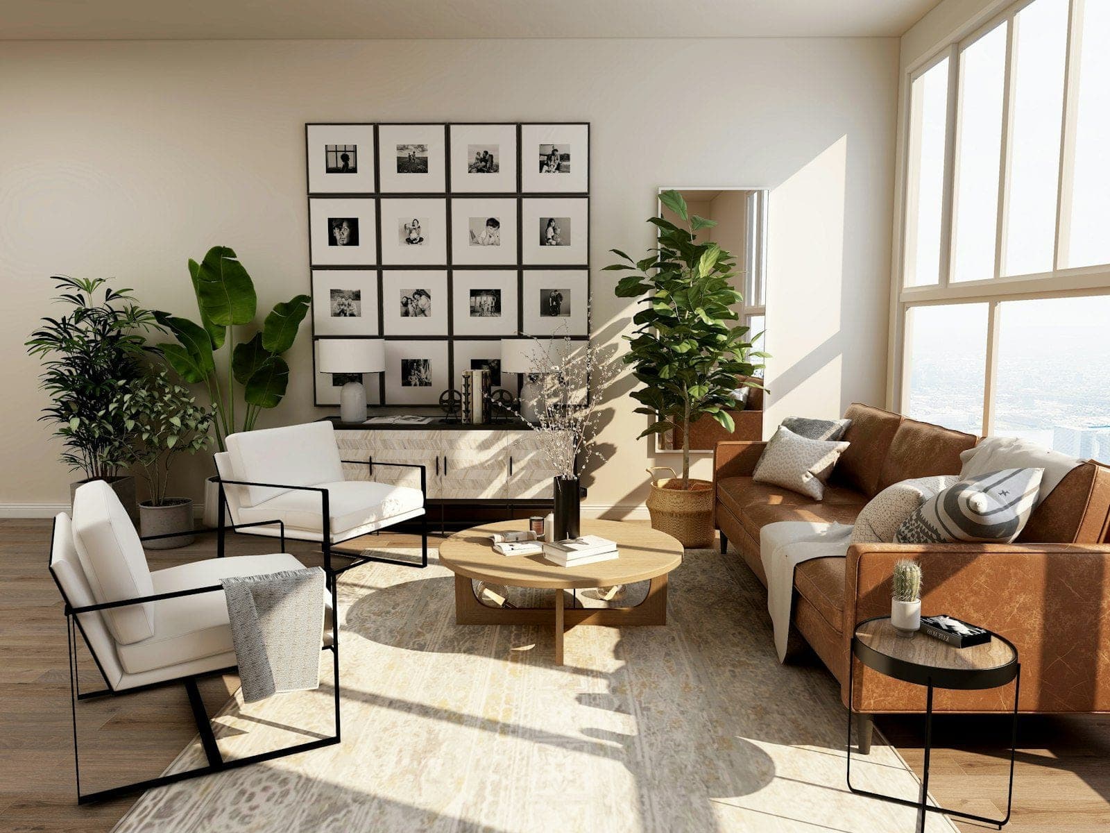 Living com quadros e sofá de couro